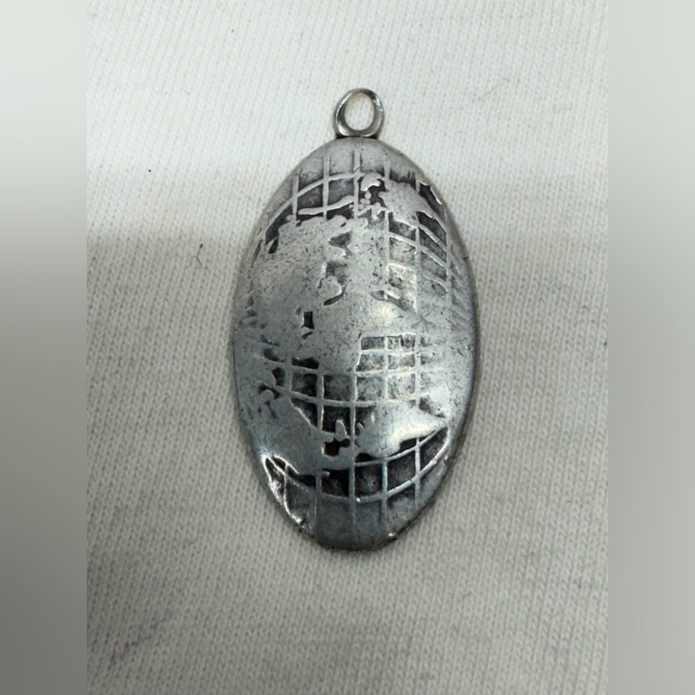 Tiffany & Co. Sterling Silver World Map Pendant